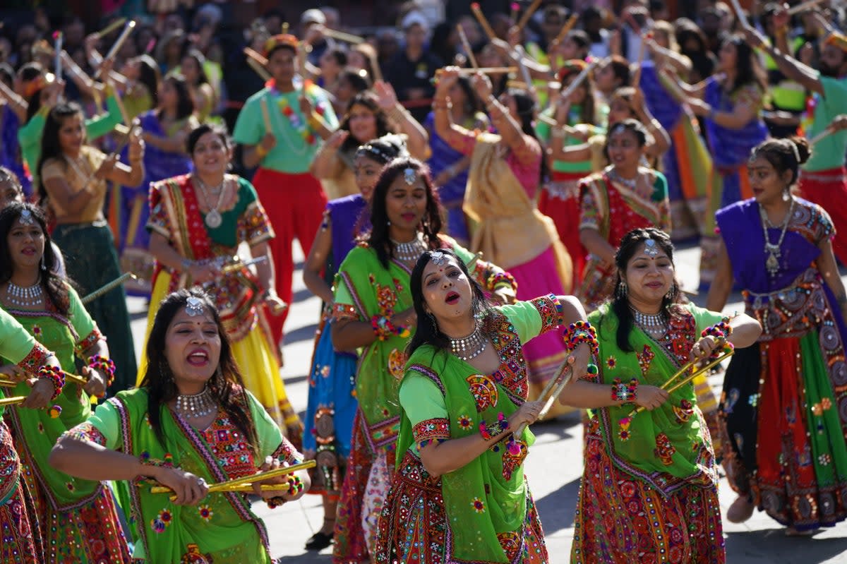 Celebration time: Dancers performing at Trafalgar Square’s annual Diwali event  (PA)
