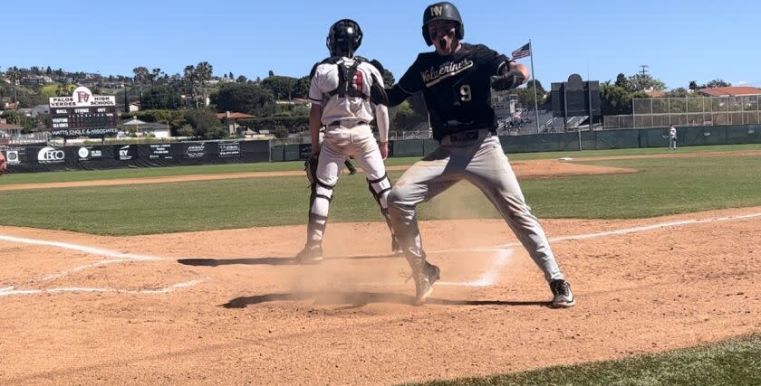Cade Goldstein is fired up scoring on a wild pitch in the top of the 14th inning to give Harvard-Westlake a 1-0 win