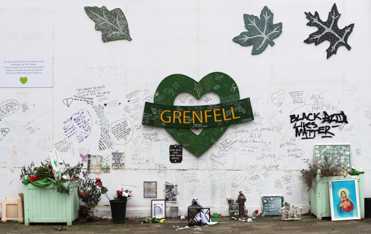 <p>The Grenfell Memorial Wall in the grounds of Kensington Aldridge Academy</p> (PA)