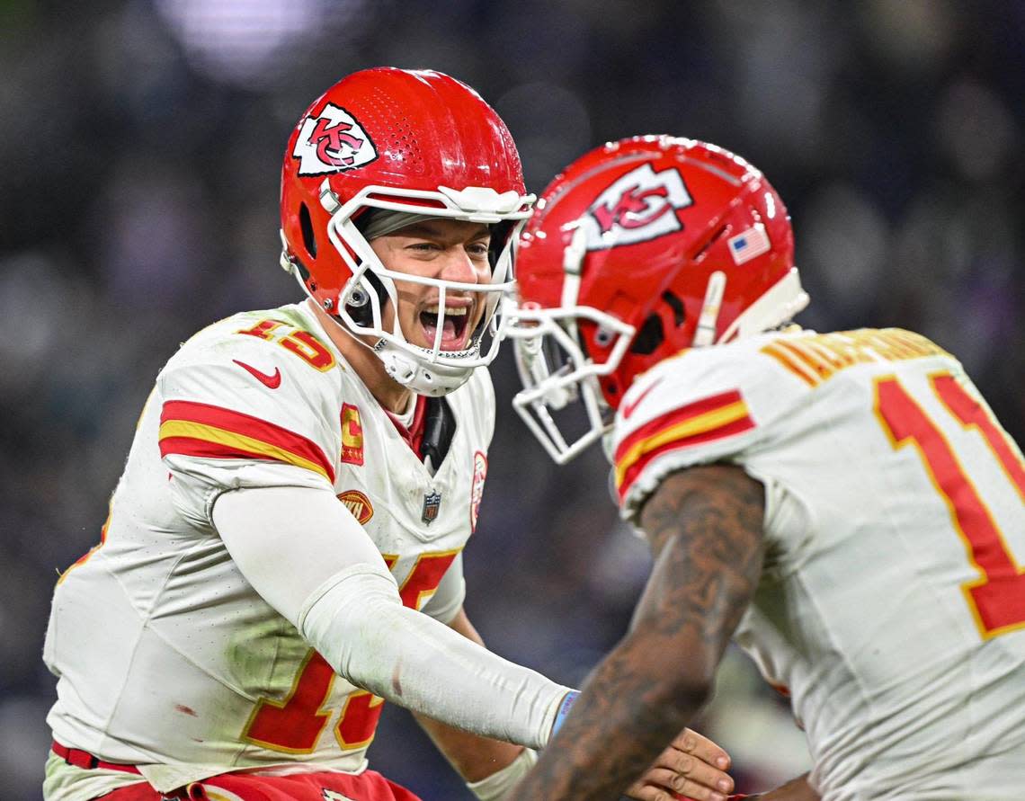 Kansas City Chiefs quarterback Patrick Mahomes (15) celebrates with wide receiver Marquez Valdes-Scantling (11) after Valdes-Scantling hauled in a long pass late in the fourth quarter against the Baltimore Ravens Sunday, Jan. 28, 2024, during the AFC Championship Game in Baltimore. Nick Wagner/nwagner@kcstar.com