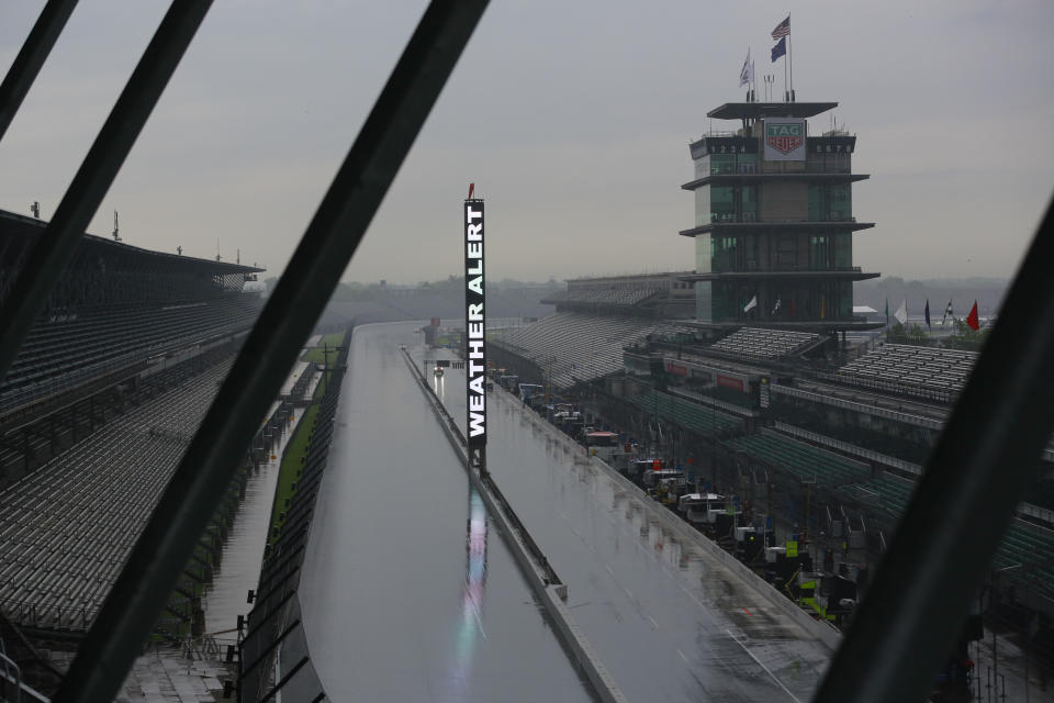 A weather alert is posted on the scoring pylon as severe weather moved through the area before the start of practice for the Indianapolis 500 IndyCar auto race at Indianapolis Motor Speedway, Friday, May 24, 2019, in Indianapolis. (AP Photo/R Brent Smith)