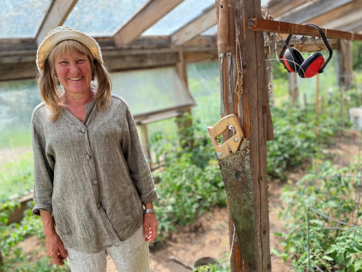 Ann Rosenquist stands in the greenhouse at North Wind Organic Farm that she and her partner, Tom Galazen operate west of Bayfield. Rosenquist has returned to the farm after competing on The HISTORY Channel's survival series "Alone."