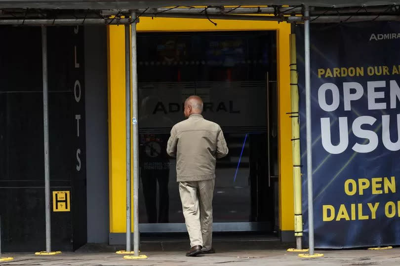 A punter walks into Admiral -Credit:Manchester Evening News