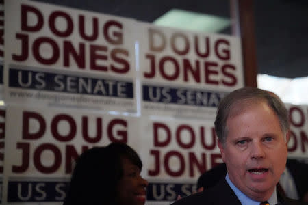 Democratic Alabama U.S. Senate candidate Doug Jones attends a campaign rally in Birmingham, Alabama, U.S., December 10, 2017. REUTERS/Carlo Allegri??