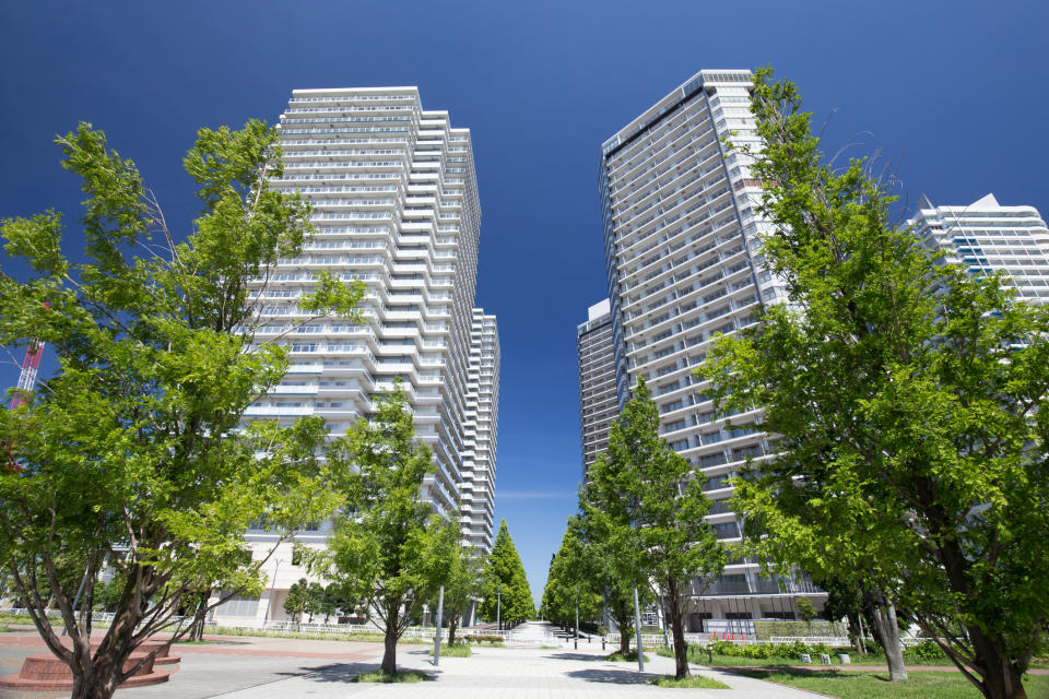 High-rise apartment buildings in urban setting.