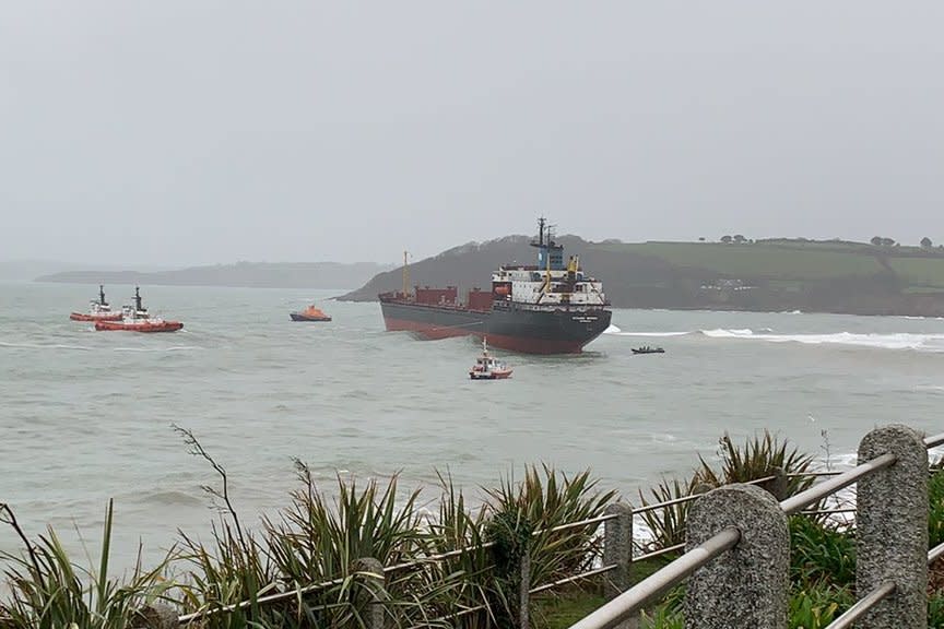 Three tugs are trying to move the grounded ship (@NDK72/Twitter)