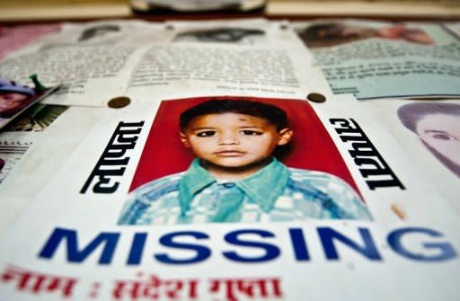 The photographs of missing Indian children are displayed at a police station in New Delhi. According to recent crime statistics, 14 children go missing in New Delhi every day, at least six of whom are victims of human trafficking
