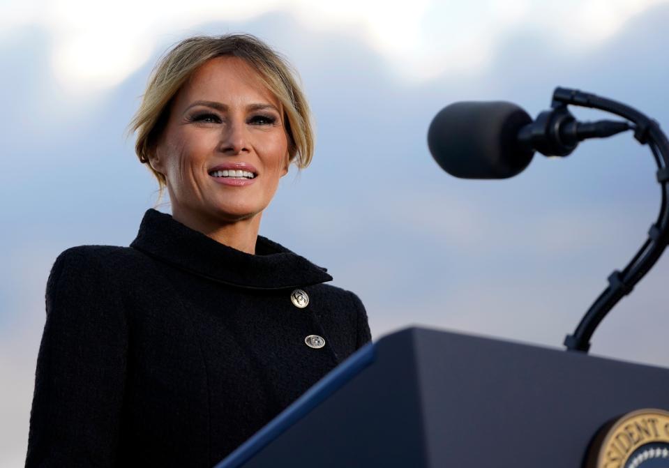 US First Lady Melania Trump speaks before boarding Air Force One at Joint Base Andrews in Maryland on January 20, 2021. - US President Donald Trump travels to his Mar-a-Lago golf club residence in Palm Beach, Florida, and will not attend the inauguration for President-elect Joe Biden.