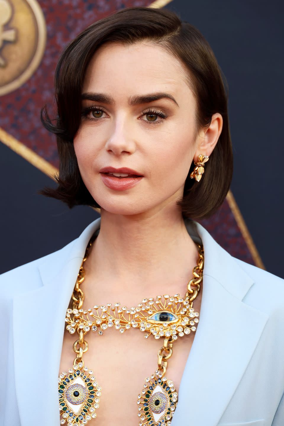 lily collins cuts hair into short bob