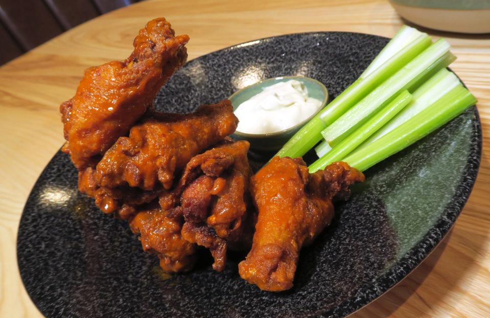 Buffalo wings at Baseline Social in the Fort Monmouth Commissary in Oceanport. The entertainment destination has bars, five virtual golf bays, a stage for DJs and live music, and a restaurant inside too.