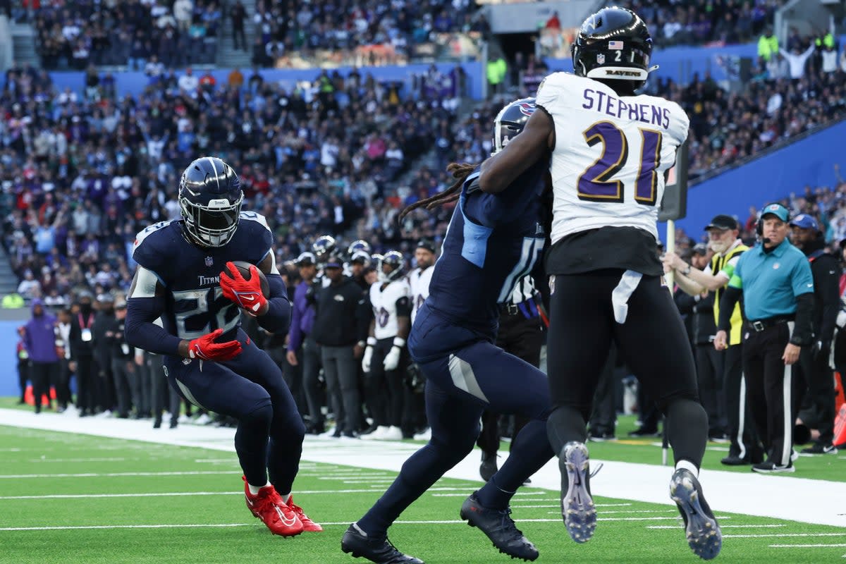 Tennessee Titans running back Derrick Henry (22) runs the ball for a touchdown (AP)