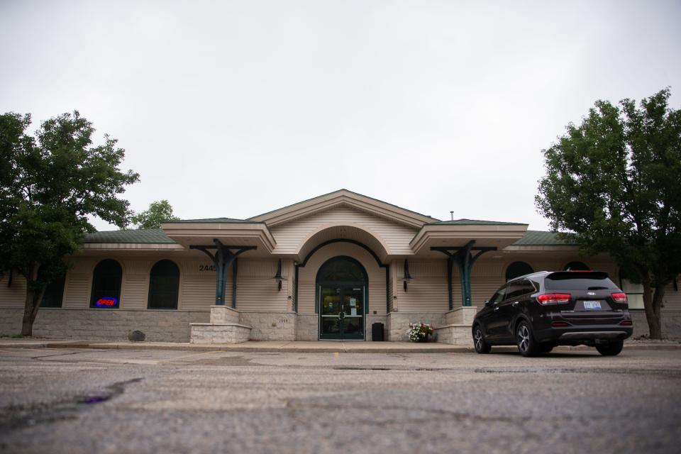 The exterior of the Patmos Library Friday, Aug. 5, 2022, in Jamestown Township. The future of the library is uncertain after the failure of the renewal of a property tax millage to fund the library after a campaign. The millage was voted down after a small conservative group campaigned against the millage after the library rejected removing LGBTQ materials from its shelves.