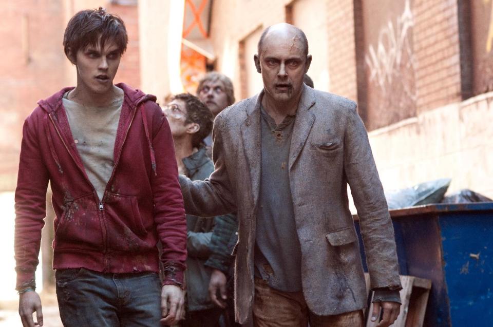 This film image released by Summit Entertainment shows Rob Corddry, right, and Nicholas Hoult in a scene from "Warm Bodies." (AP Photo/Summit Entertainment, Jonathan Wenk)