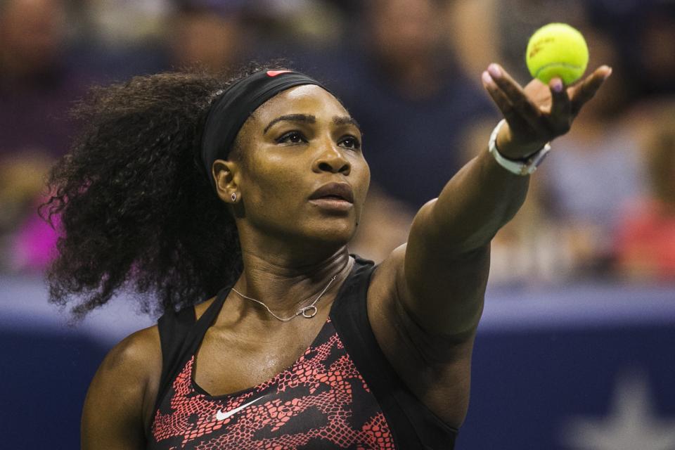 Serena Williams of the U.S. serves to Vitalia Diatchenko of Russia during their match at the U.S. Open Championships tennis tournament in New York, August 31, 2015. REUTERS/Lucas Jackson