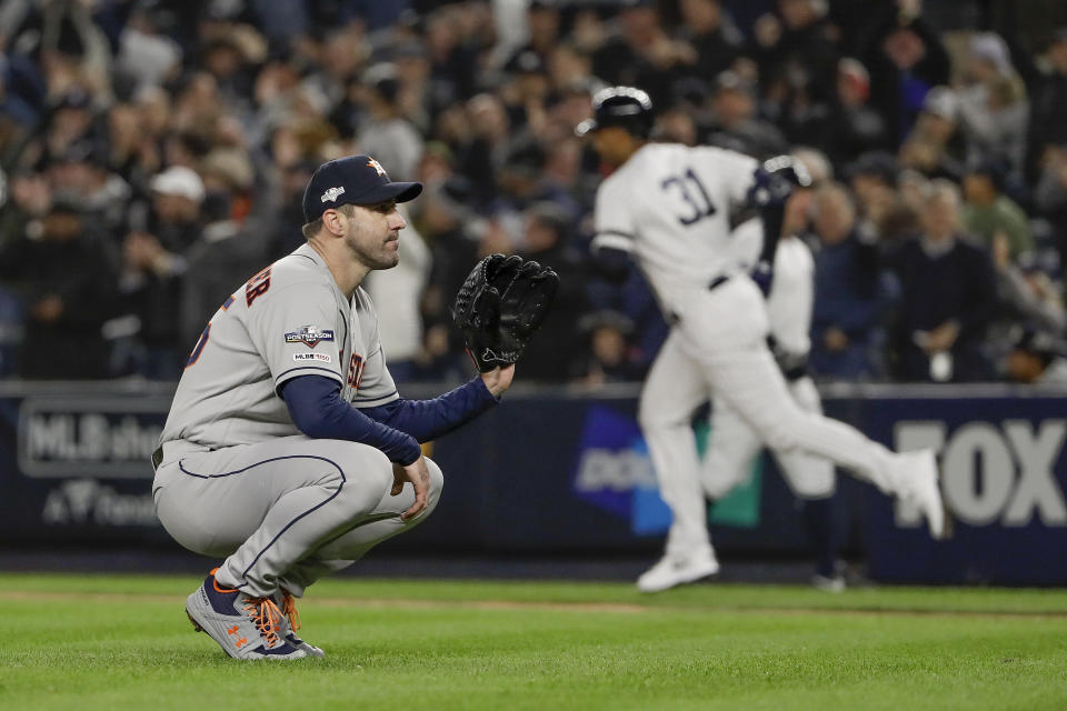 Houston Astros starting pitcher Justin Verlander (35) reacts after giving up a three-run home run against the New York Yankees during the first inning of Game 5 of baseball's American League Championship Series, Friday, Oct. 18, 2019, in New York. (AP Photo/Frank Franklin II)