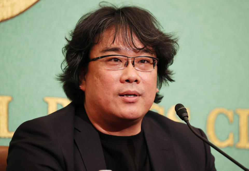 Bong Joon-ho speaking at a press conference