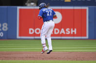 Toronto Blue Jays' Vladimir Guerrero Jr runs the bases after hitting a two-run home run, which also scored Bo Bichette, in the third inning of a baseball game against the Boston Red Sox in Toronto, Monday, June 27, 2022. (Jon Blacker/The Canadian Press via AP)