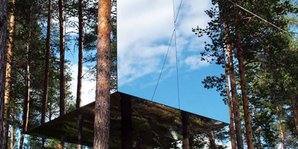 <b>Mirror Tree House, Sweden</b> This four-metre glass cube reflects the surrounding nature, rendering it almost invisible. This unique elevated accommodation can house two people and includes a large bed, a small kitchenette and bath, a living room and roof terrace.
