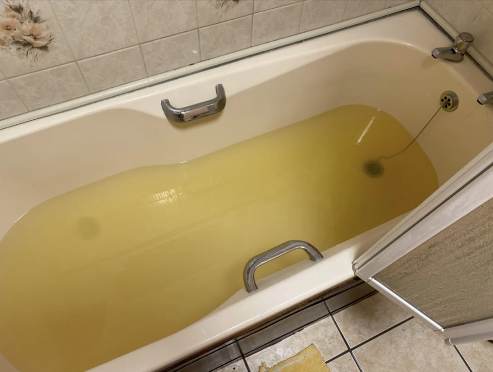 Yellow water in the tub