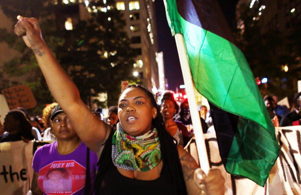 <p>Protesters march during another night of protests over the police shooting of Keith Scott in Charlotte, North Carolina, U.S. September 23, 2016. (Mike Blake/Reuters)</p>