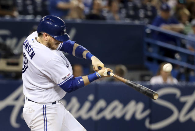 Superstitious' Blue Jays catcher Danny Jensen shaves in dugout