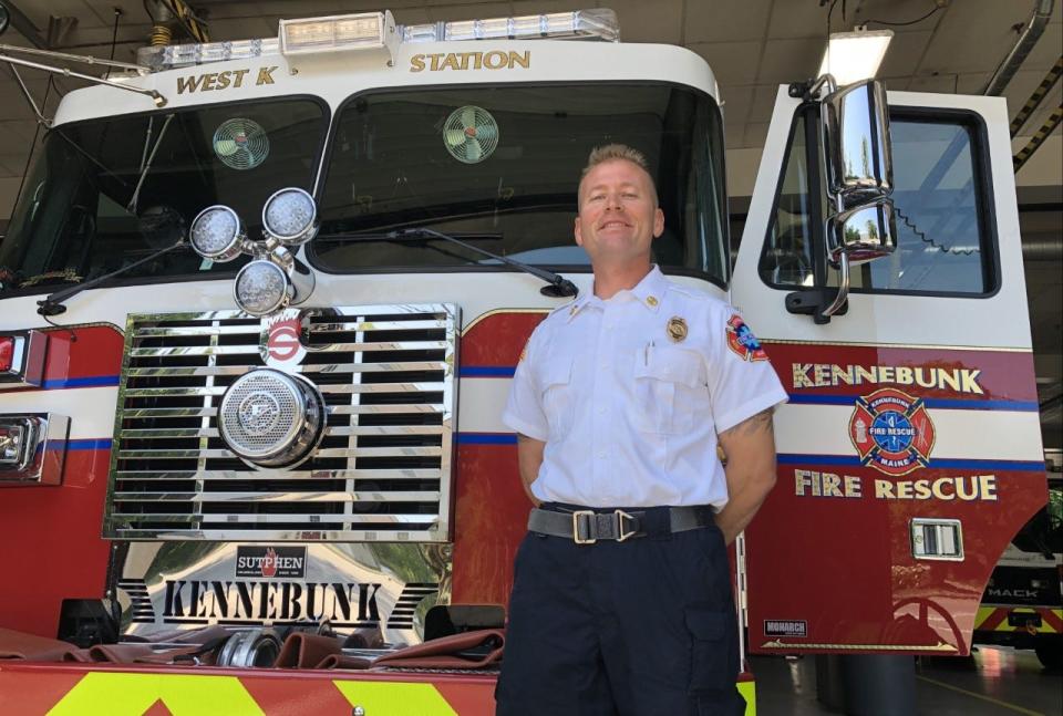 Justin Cooper is the new chief of Kennebunk Fire Rescue. He is seen here at Central Station on Wednesday, July 20, 2022, alongside the department's new engine.