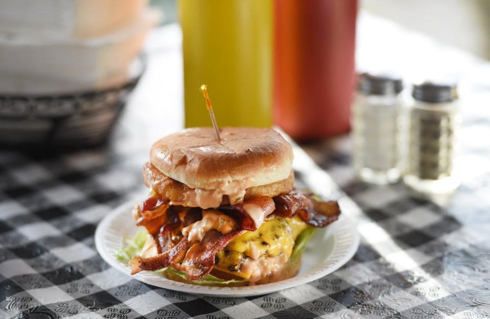 Let your sweetheart get her paws around this hefty cheeseburger; she'll walk away with a red rose too on Valentine's Day 2022.