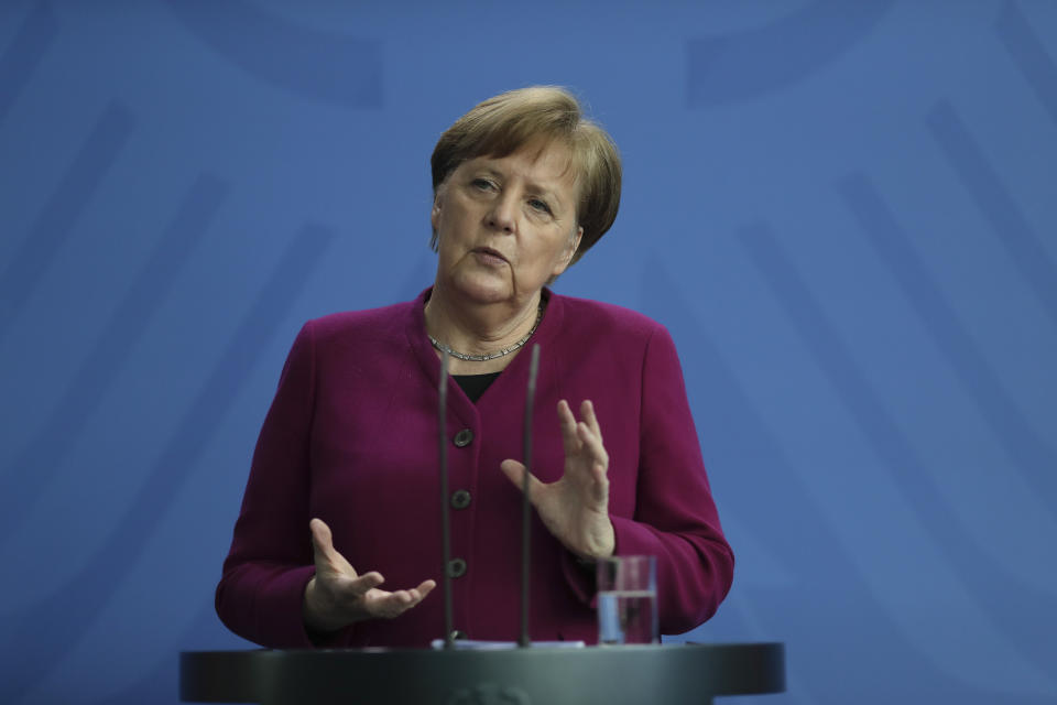 German Chancellor Angela Merkel briefs the media about measures of the German government to avoid further spread of the coronavirus at the chancellery in Berlin, Germany, Thursday, April 9, 2020. In order to slow down the spread of the coronavirus, the German government has considerably restricted public life and asked the citizens to stay at home. The new coronavirus causes mild or moderate symptoms for most people, but for some, especially older adults and people with existing health problems, it can cause more severe illness or death. (AP Photo/Markus Schreiber, Pool)