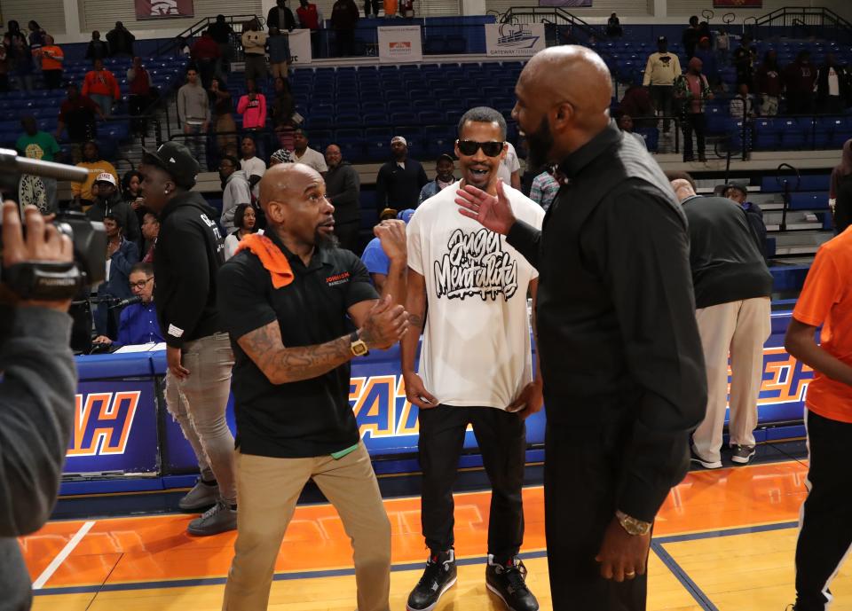 Johnson Coach Chuck Campbell has some fun with Dougherty coach Bakari Bryant on Saturday, March 2, 2024 during the State Class 3-A semifinals at Savannah State University.