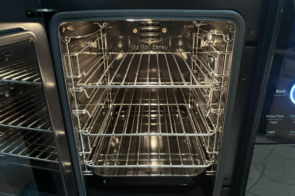 GE Profile Smart Indoor Smoker's interior, including removable racks, rack holders and the drip pan.