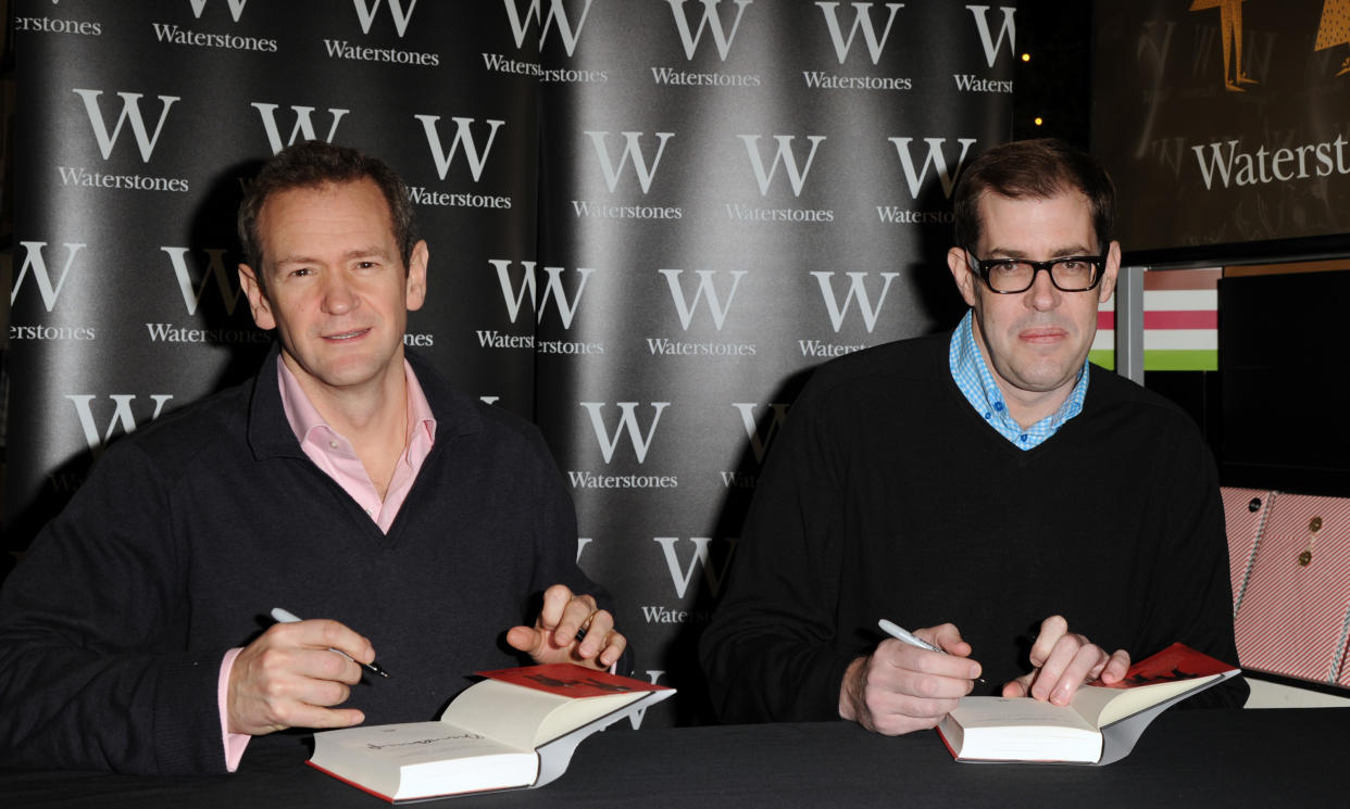 LONDON, UNITED KINGDOM - DECEMBER 11: Alexander Armstrong and Richard Osman meet fans and sign copies of 'The 100 Most Pointless Arguments In The World' at Waterstones Leadenhall on December 11, 2013 in London, England. (Photo by Eamonn McCormack/WireImage)