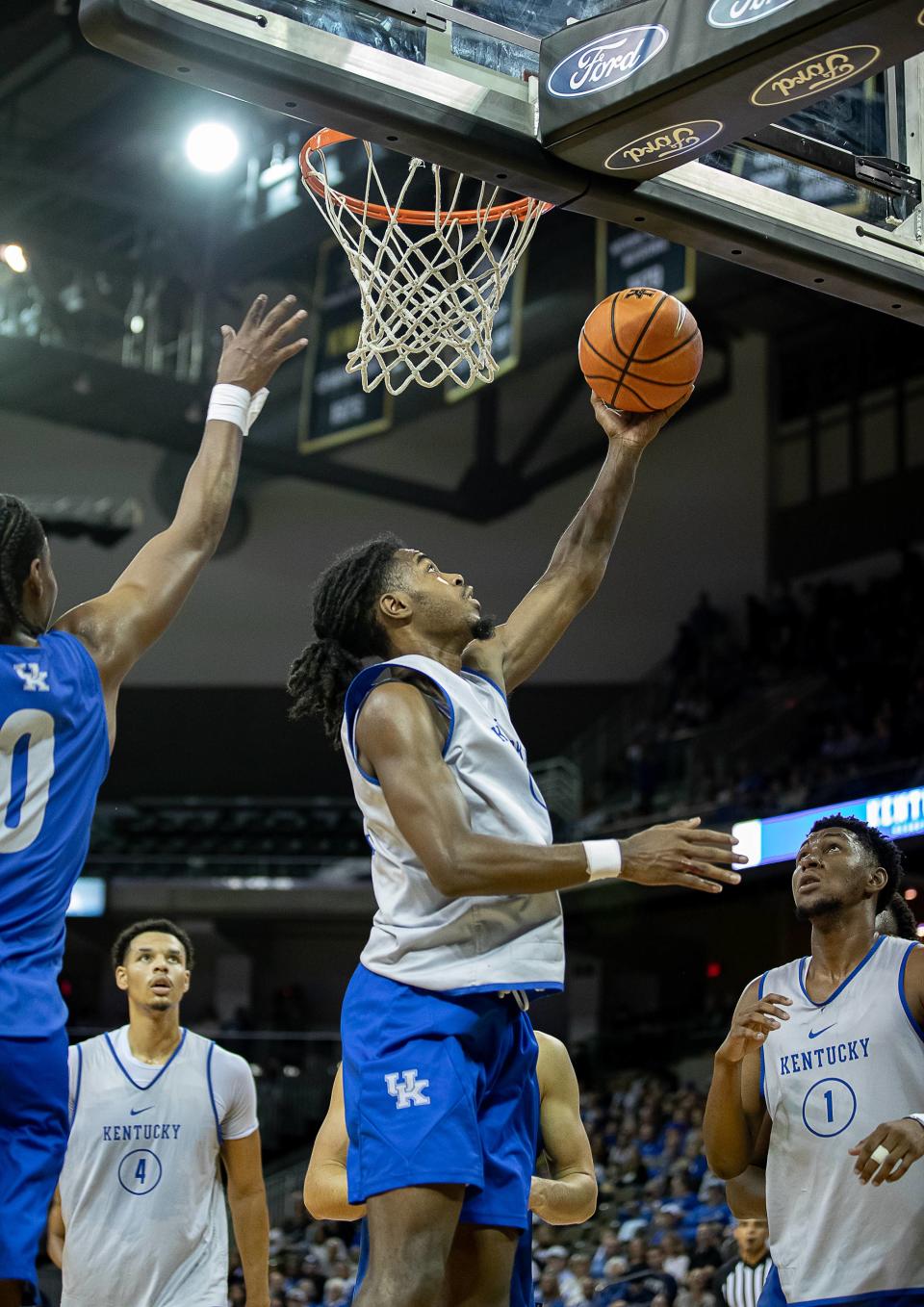 Kentucky's Antonio Reeves dropped in a reverse layup during the Blue-White scrimmage last weekend. Reeves played well, but the White squad lost.