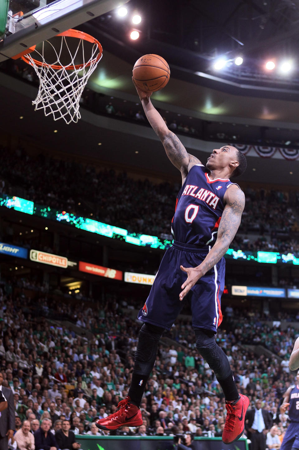 BOSTON, MA - MAY 10: Jeff Teague #0 of the Atlanta Hawks takes a shot in the second half against the Boston Celtics in Game Six of the Western Conference Quarterfinals in the 2012 NBA Playoffs on May 10, 2012 at TD Garden in Boston, Massachusetts. The Boston Celtics defeated the Atlanta Hawks 83-80. NOTE TO USER: User expressly acknowledges and agrees that, by downloading and or using this photograph, User is consenting to the terms and conditions of the Getty Images License Agreement. (Photo by Elsa/Getty Images)