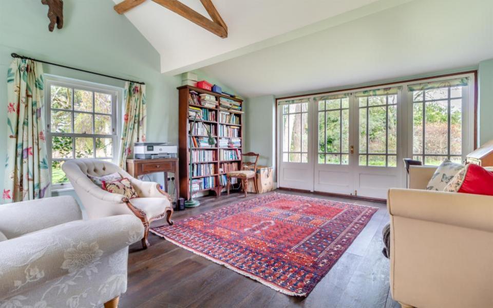 Eastern Daily Press: The sitting room has French doors leading out to the garden