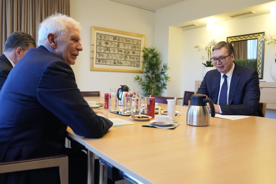 Serbian President Aleksandar Vucic, right, speaks with European Union foreign policy chief Josep Borrell during a meeting in Brussels, Monday, Feb. 27, 2023. The leaders of Serbia and Kosovo are holding talks Monday on European Union proposals aimed at ending a long series of political crises and setting the two on the path to better relations and ultimately mutual recognition. (AP Photo/Virginia Mayo)