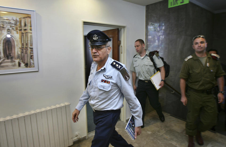 FILE - Israeli army Chief of Staff Dan Halutz arrives to attend the Israeli weekly cabinet meeting in Jerusalem Sunday Aug. 13, 2006. A contentious judicial overhaul that is dividing Israel is tearing at the country's main unifying force: the military. Halutz has said he wouldn't show up for duty after the overhaul if Israel was at war. He said soldiers won't agree to become "mercenaries for a dictator." (AP Photo/Ronen Zvulun, Pool, File)