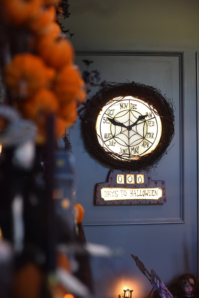 Halloween clock mounted on wall.