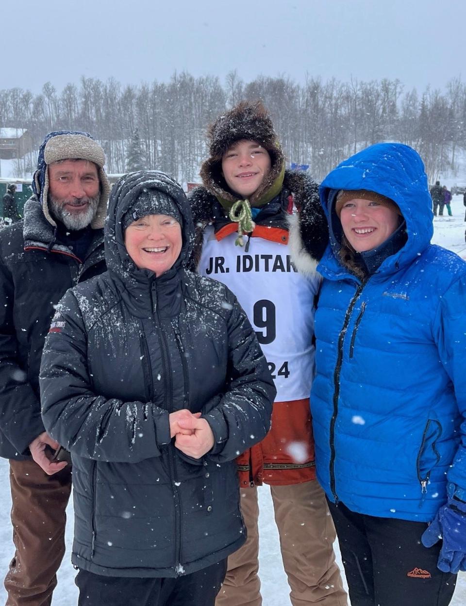 Morgan Martens (second from right) poses with his family at the Junior Iditarod in Alaska. He's with, from left, his father, Tim, mother, Janet, and sister, Talia. Talia and Morgan are partners in the Martens Mushing team.