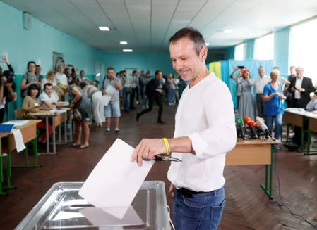 Leader of the Voice party Vakarchuk casts his ballot at a polling station during Ukraine's parliamentary election in Kiev
