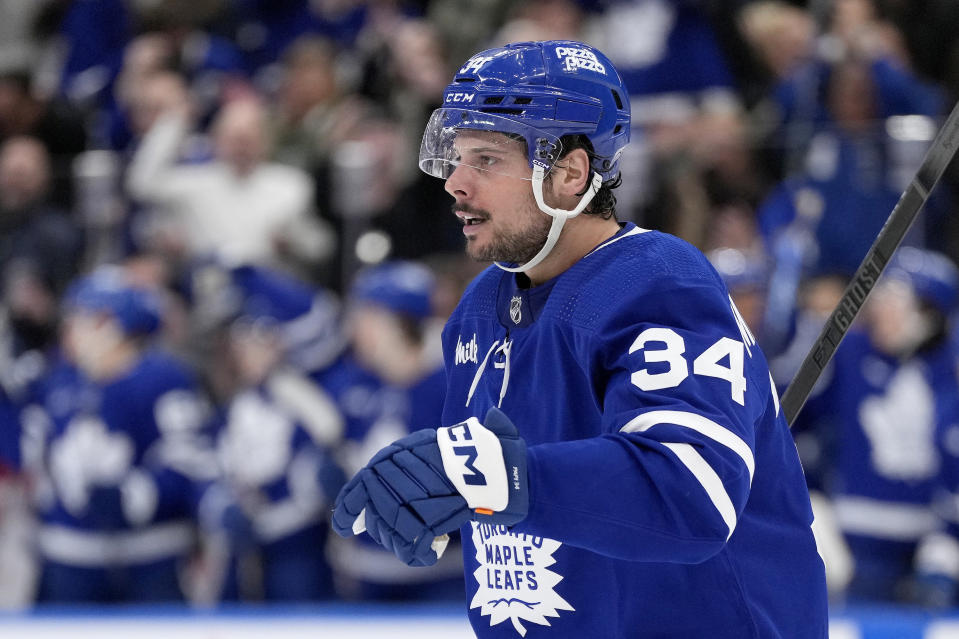 Toronto Maple Leafs center Auston Matthews (34) celebrates his goal against the Detroit Red Wings during the second period of an NHL hockey game Saturday, April 13, 2024, in Toronto. (Frank Gunn/The Canadian Press via AP)