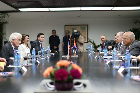 Thomas Donohue (L), President and CEO of the U.S. Chamber of Commerce speaks with Vice President of Cuba's Council of Ministers Ricardo Cabrisas Ruiz (R) in Havana, Cuba, January 13, 2017. REUTERS/Alexandre Meneghini