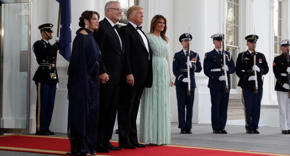 Jenny and Scott Morrison pose with US president Trump and his wife Melania at the state dinner. 