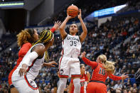 UConn guard Azzi Fudd (35) shoots over Dayton guard Ivy Wolf (10) in the first half of an NCAA college basketball game, Wednesday, Nov. 8, 2023, in Storrs, Conn. (AP Photo/Jessica Hill)