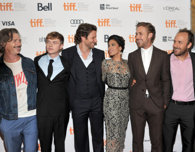 TORONTO, ON – SEPTEMBER 07: (L-R) Actors Ben Mendelsohn, Dane DeHaan, Bradley Cooper, Eva Mendes, Ryan Gosling, and Writer/Director Derek Cianfrance attend “The Place Beyond The Pines” premiere during the 2012 Toronto International Film Festival at Princess of Wales Theatre on September 7, 2012 in Toronto, Canada. <em>Photo by Sonia Recchia/Getty Images.</em>