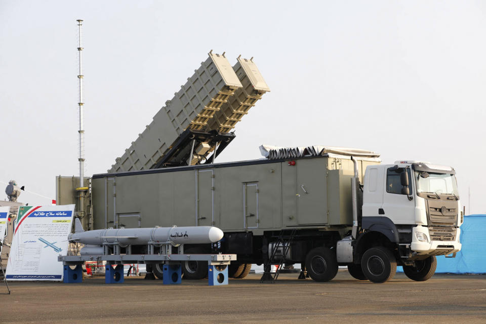 In this picture released by the official website of the Iranian Army on Sunday, Dec. 24, 2023, Talaeieh missile system is displayed in an unveiling ceremony at a naval base near the Indian Ocean in the southern Iranian port of Konarak, some 850 miles (1,400 kilometres) southeast of the capital, Tehran, Iran. Iran's navy on Sunday added domestically produced sophisticated cruise missiles to its arsenal, state TV reported. (Iranian Army via AP)
