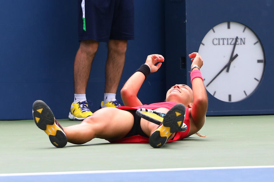 Aug 30, 2014; New York, NY, USA; Aleksandra Krunic (SRB) falls to the ground after defeating Petra Kvitova (CZE) at Armstrong Stadium on day six of the 2014 U.S. Open tennis tournament at USTA Billie Jean King National Tennis Center. (Anthony Gruppuso-USA TODAY Sports)