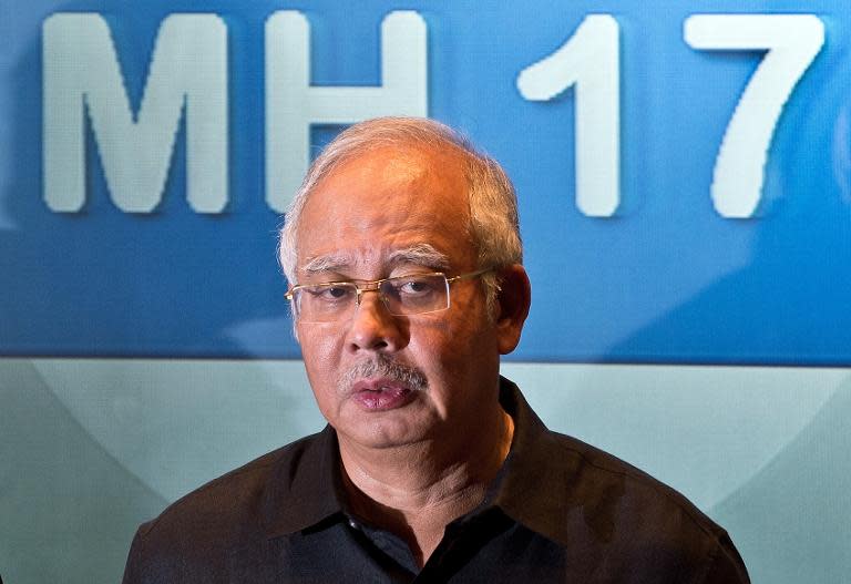 Malaysian Prime Minister Najib Razak addresses a press conference at a hotel in Sepang, ouside Kuala Lumpur, on July 18, 2014