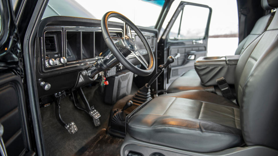 The interior of a 1975 Ford F-250 restomod pickup.