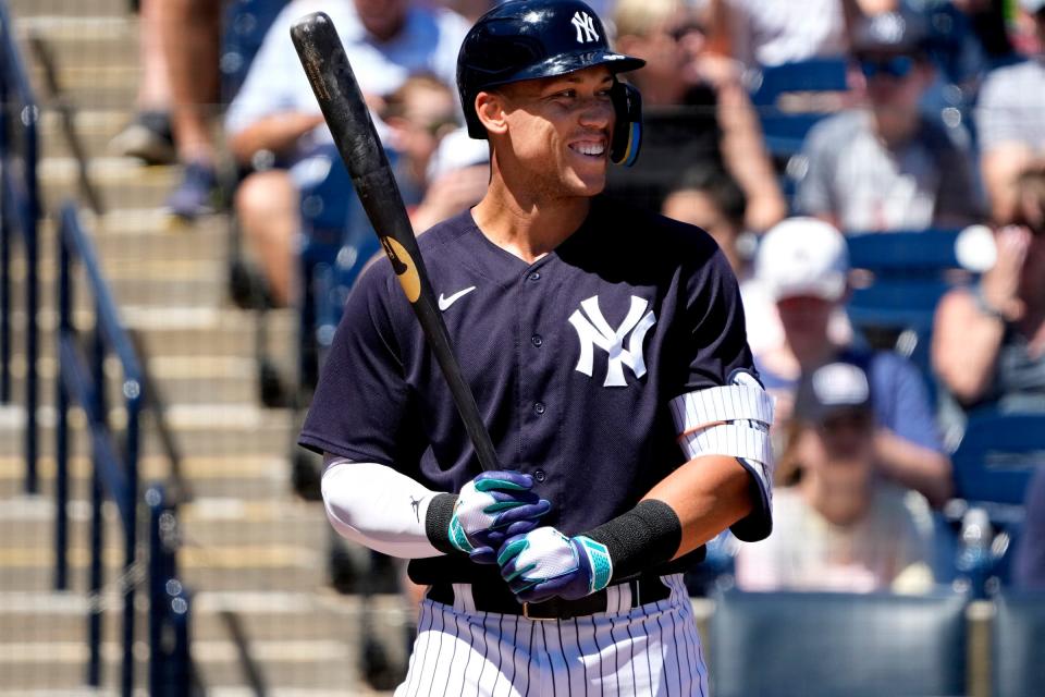 New York Yankees center fielder Aaron Judge (99) smiles before striking out against the Detroit Tigers during the first inning at George M. Steinbrenner Field in Tampa, Florida, on Tuesday, March 21, 2023.