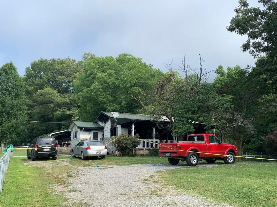 Police tape blocks off a home in Sequatchie, Tennessee, where six people including three children were found dead (2023 Chattanooga Times Free Press/AP)